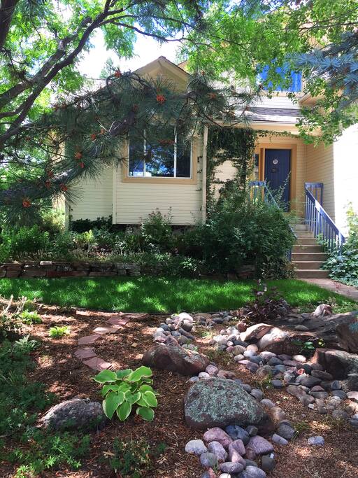 Front Door. To the right (not pictured) is an attached garage and short driveway that fits 2 cars. Also plenty of street parking.