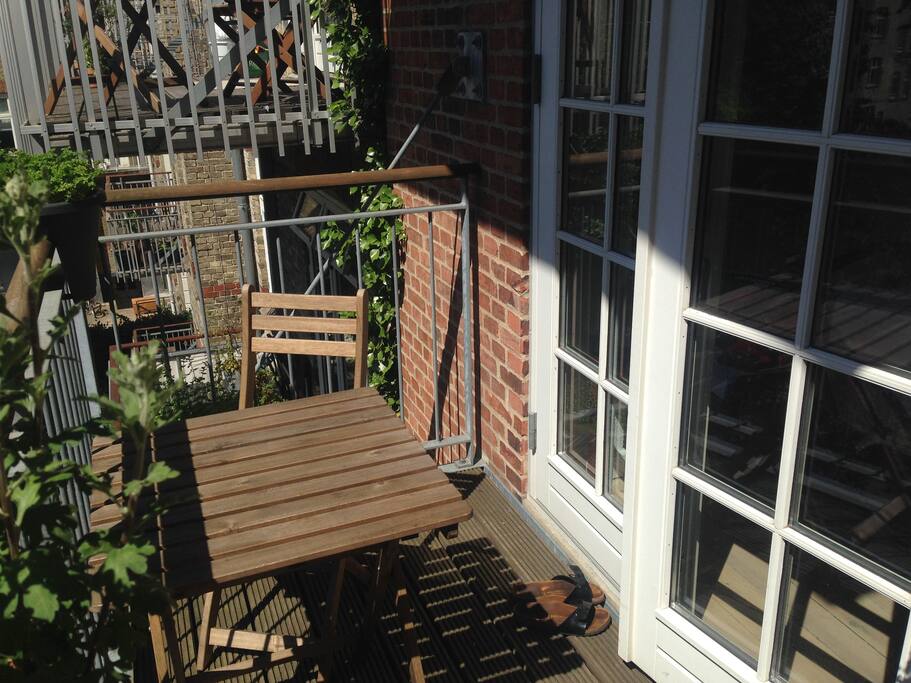 You enter the balcony from the bedroom.