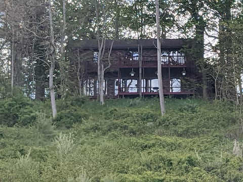 Secluded forest retreat with view