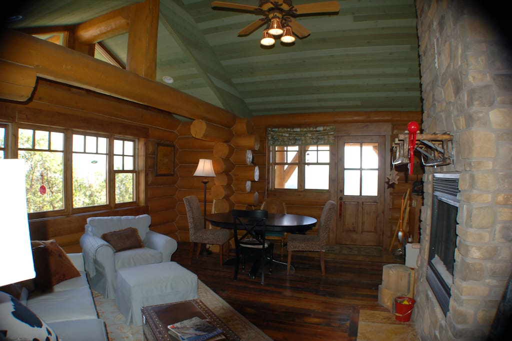 Cabin Living Room With Wood Burning Fireplace
