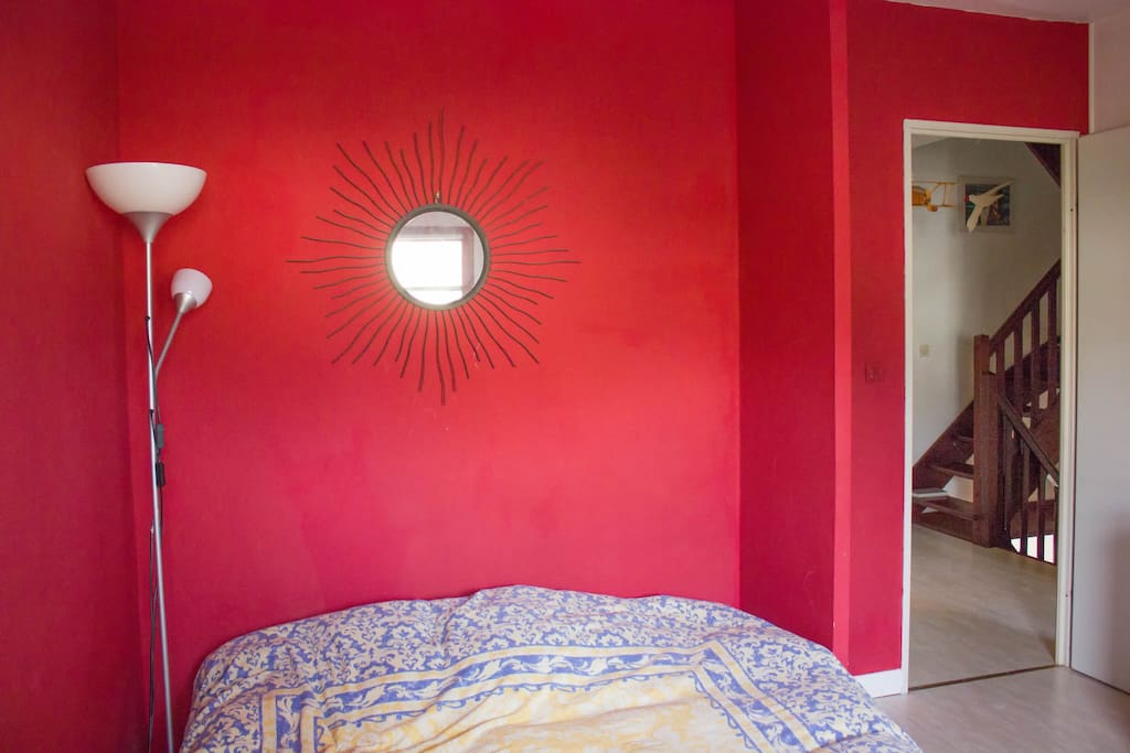 The red room, queen bed + baby