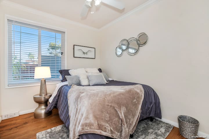 Bedroom 1 with a full size bed. 