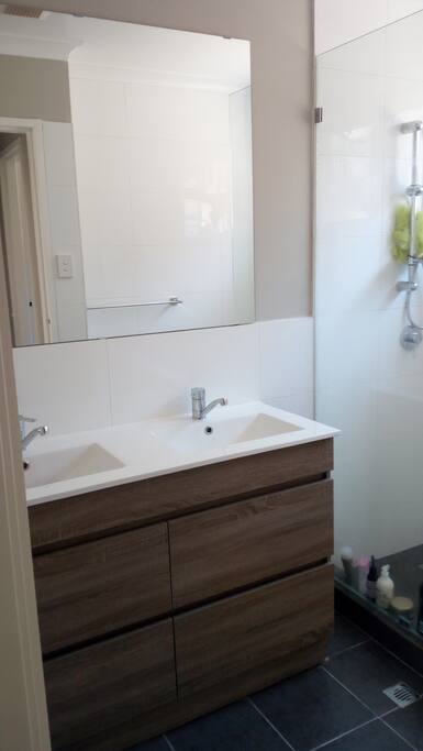 Bathroom. Towel, shampoo, conditioner, shower gel
