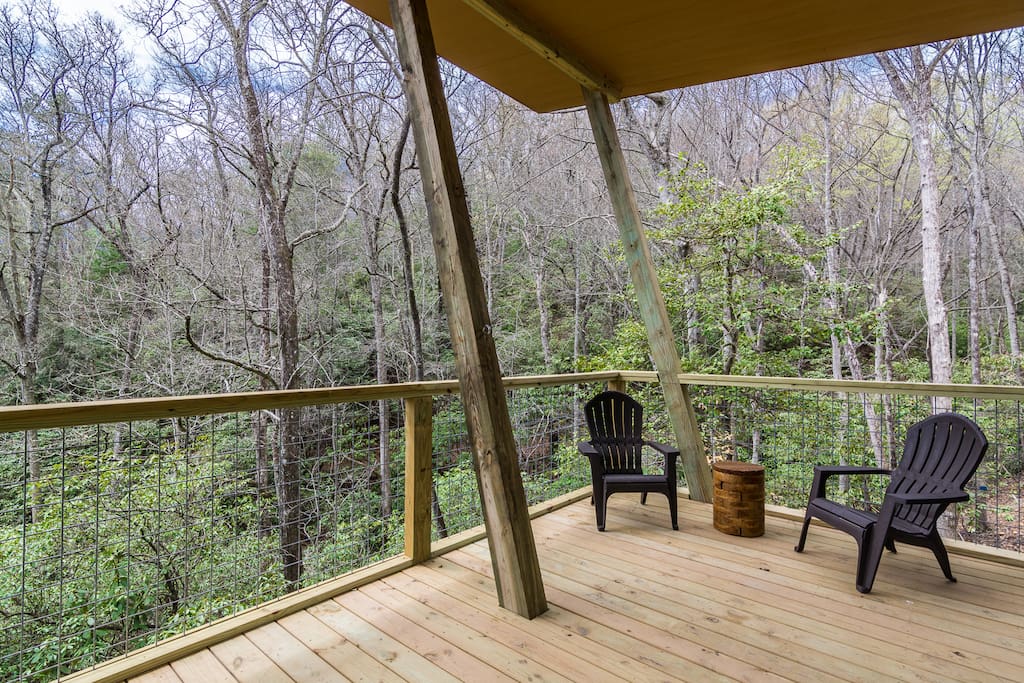 Each cabin features private covered back deck to interact with the outdoors.