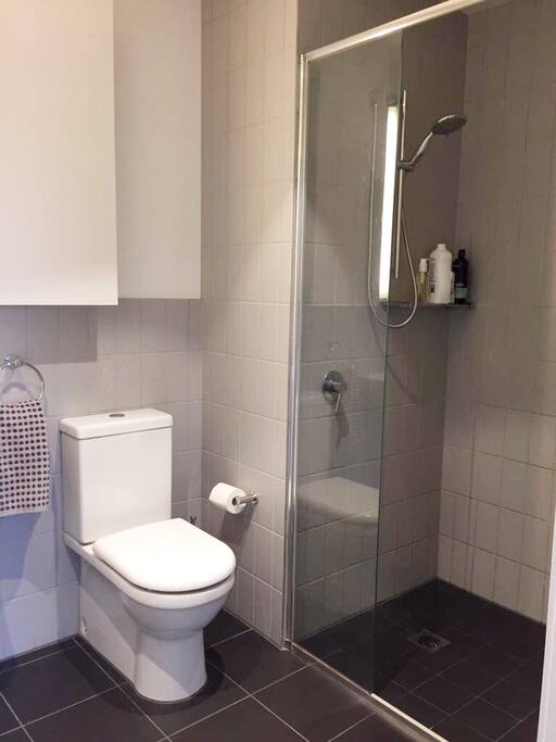 Bathroom is modern and clean