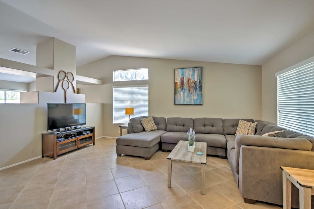A free flowing design welcomes you into the comfortable living room.