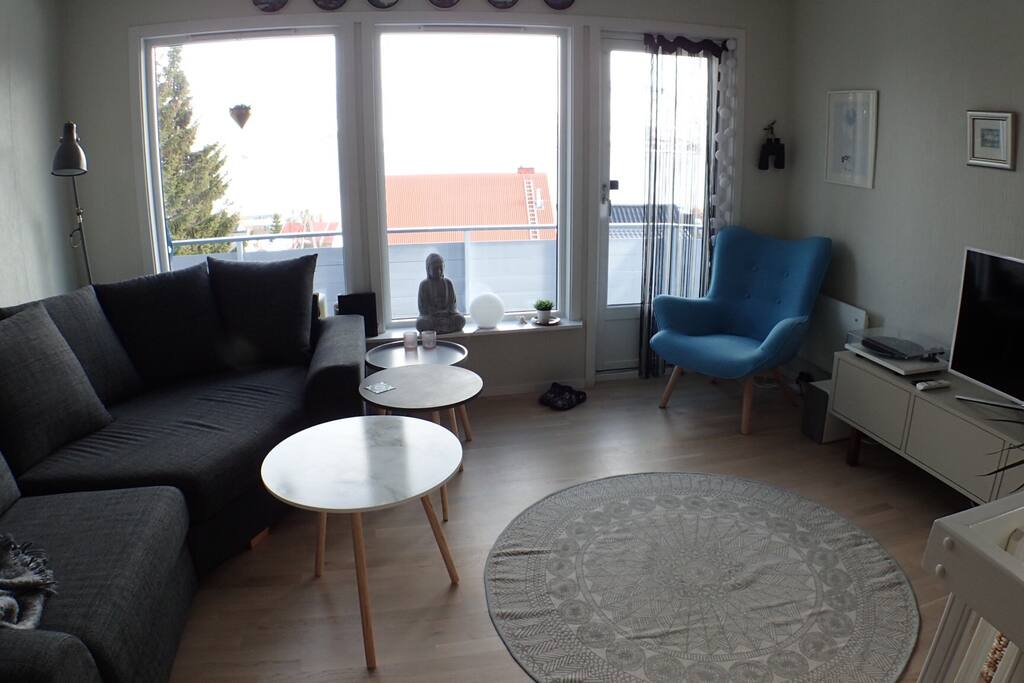 Cozy sofa to sit on and a relax chair
