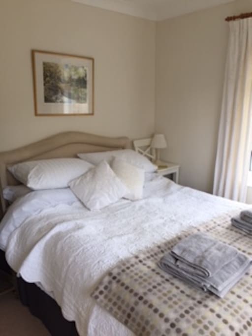 The main bedroom has a lovely comfy bed