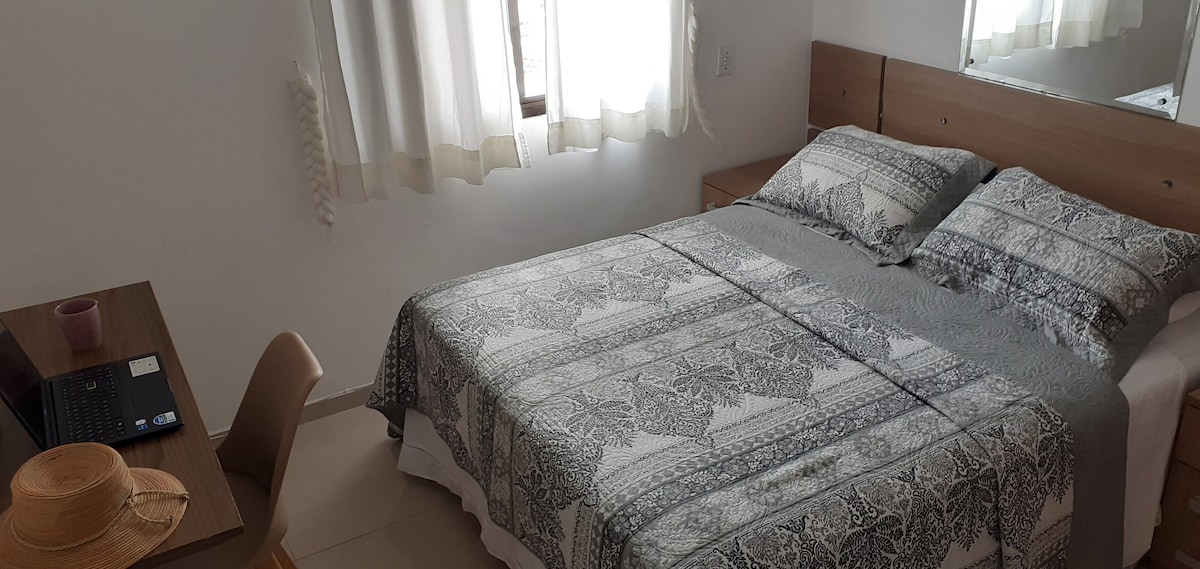 (Suite 2) It has air conditioning, ceiling fan, cabinets, study bench, 32 inch TV. Queen bed! 