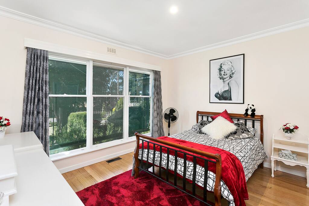 Large main bedroom with great garden views