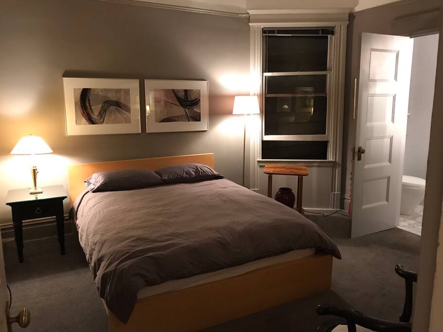 The bedroom with private half bath.