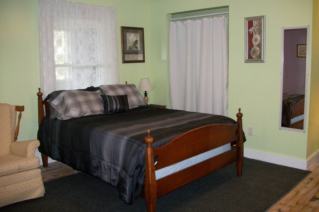 Double bed in Downstairs Suite #2