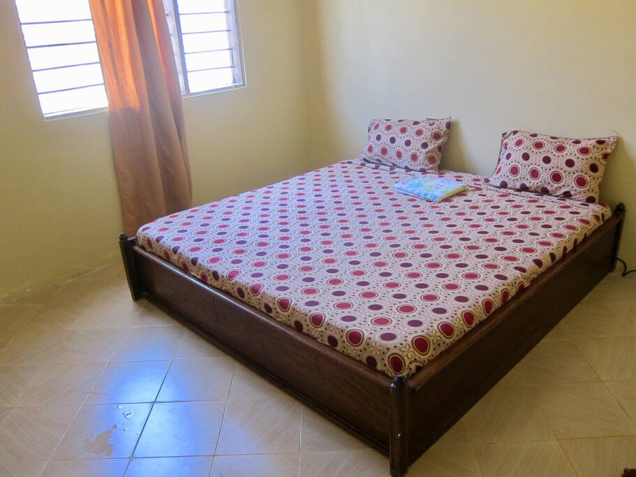 Extra king size bed. Suitable for two people.