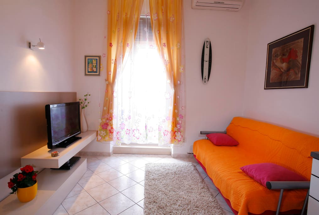 modern living room, with cableTv, Wi-FI, air conditioner
