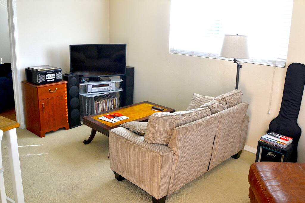 Entertainment system comes with stereo speakers; flat-screen TV; an Apple TV with subscriptions to Hulu, Netflix and HBO; studio headphones for private listening; and a record player with a wide selection of vinyl from artists old and new.
