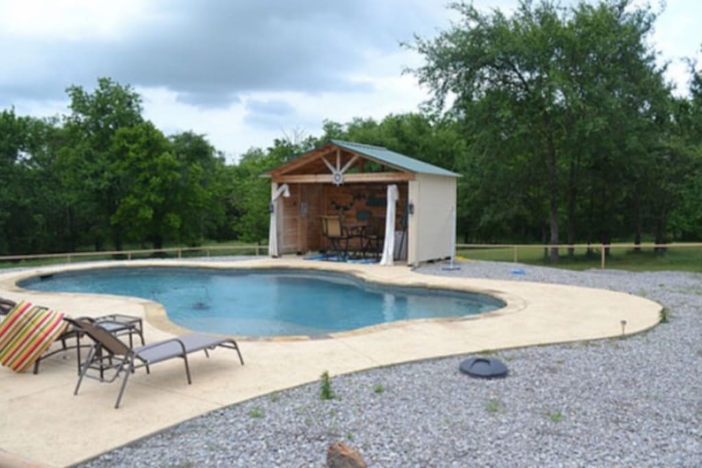 Full size pool with tiki bar