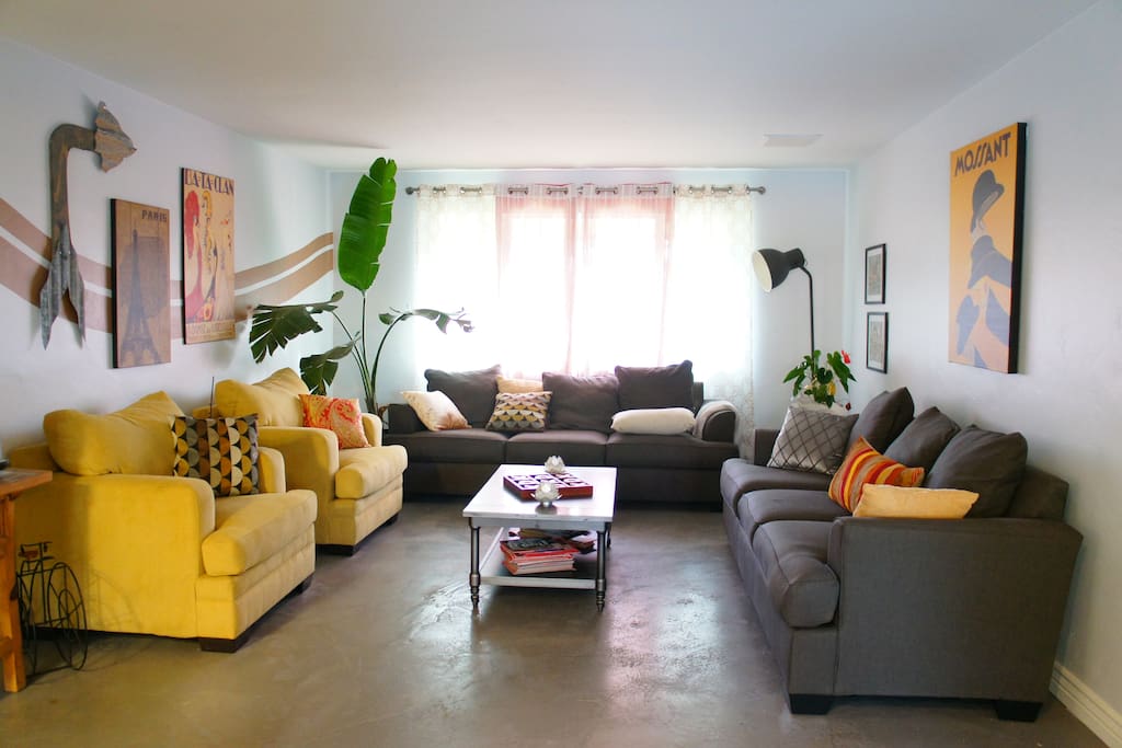 The living room is the best for hanging out, entertaining guests, or just taking a nap on any of the super comfy couches