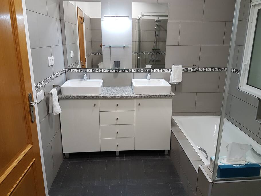 Master Bedroom One's En-Suite with Tub and Standing Shower
