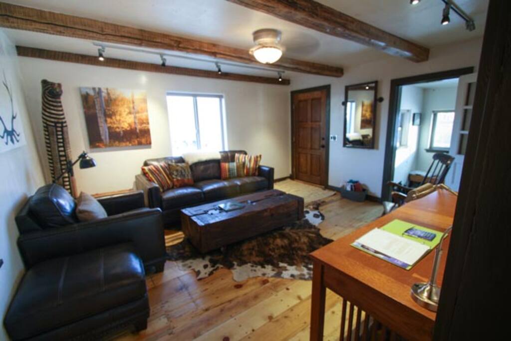 Living room, looking back at the front door.
