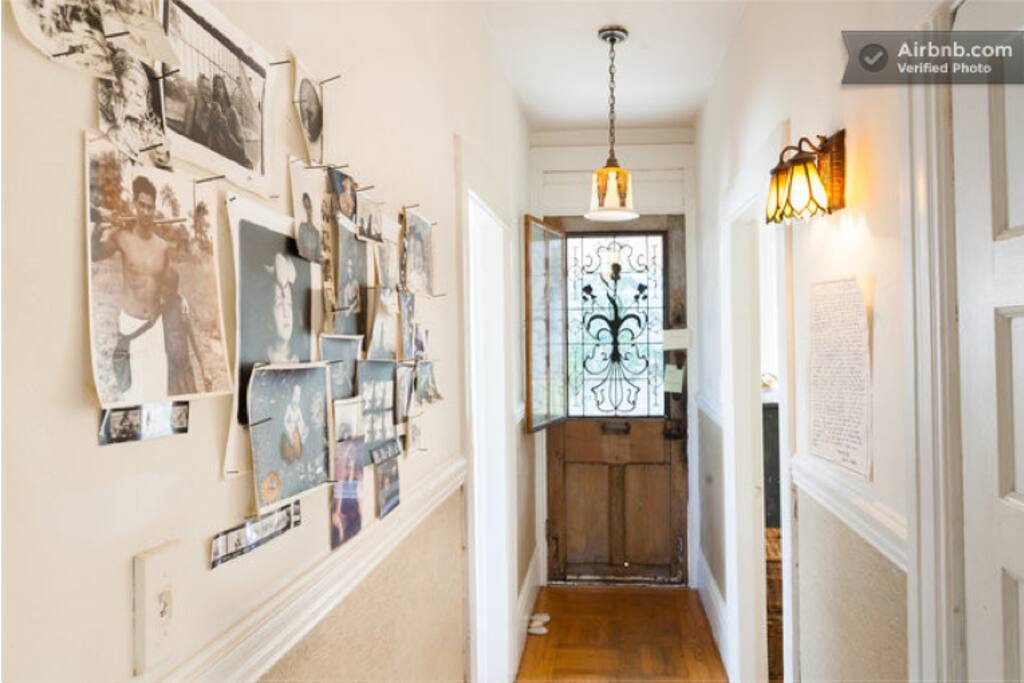 Your room is the door on the right. Front hallway and front door.