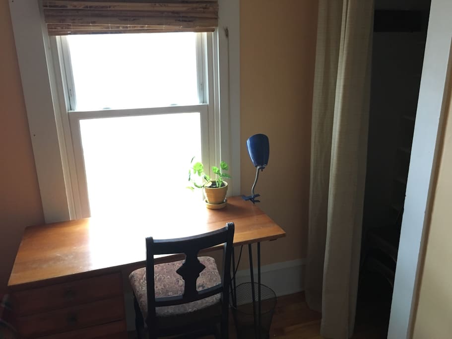 GUEST ROOM: Sunny desk and closet in the room for your use!