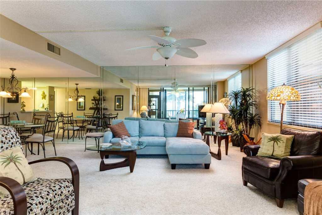 Find your favorite spot on the couch or armchair - This inviting condo is open-plan with an enclosed patio to extend your living