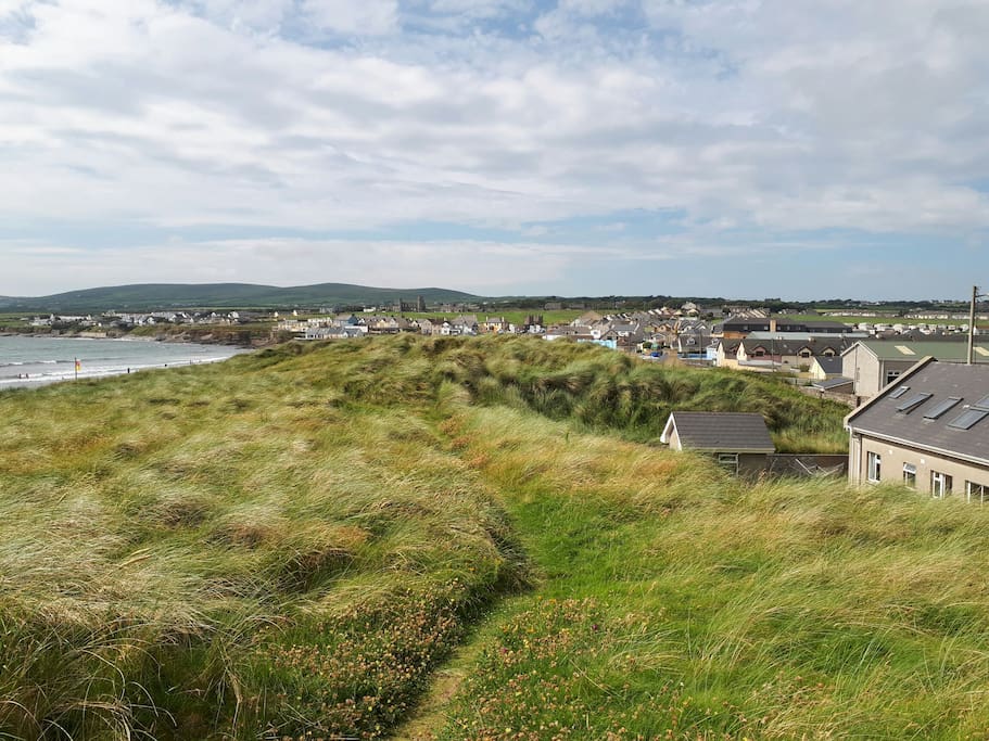 This is the rear of the property (on the right hand side of the photo), stones throw to the beach.