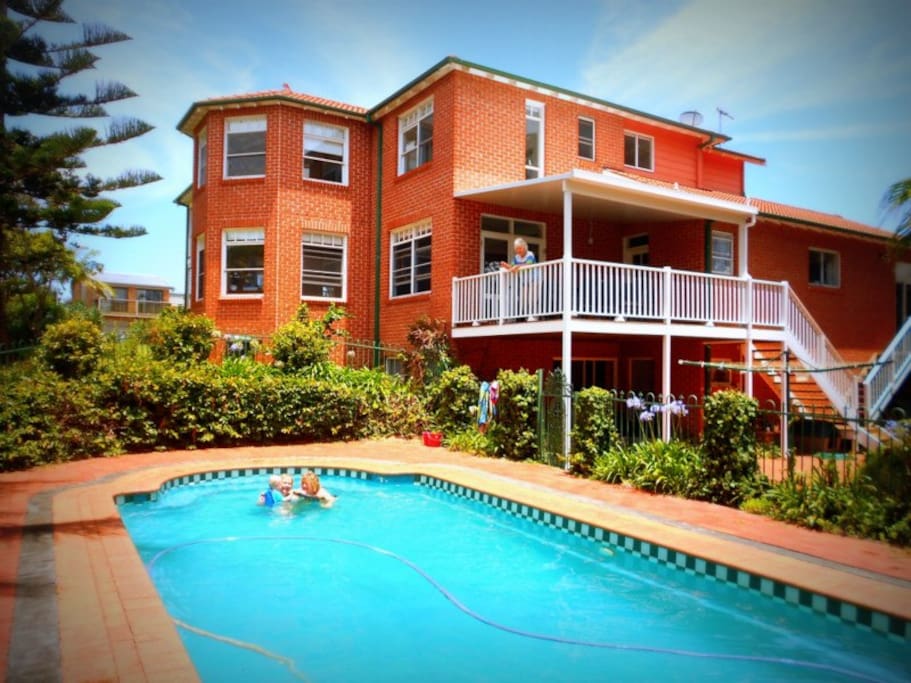 The ground floor flat has direct access to the pool