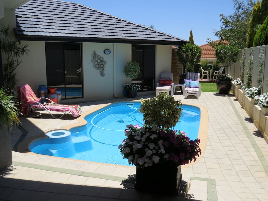 Resort Style outdoor pool and entertaining area. You'll have a sun tan withing a couple of days!!
