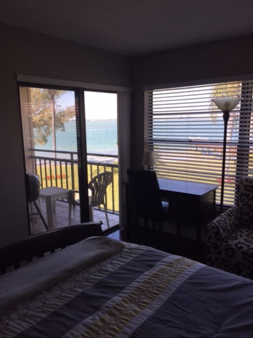 Master Bed with office space entrance to patio