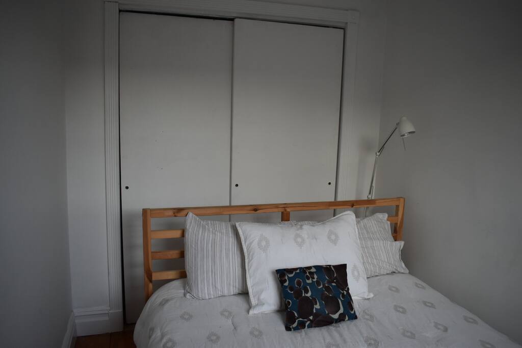 Bedroom 2, off the living room with comfortable queen bed.