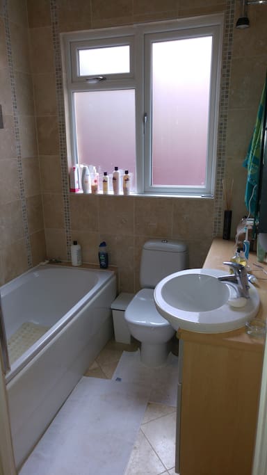 Bathroom with bath/ shower