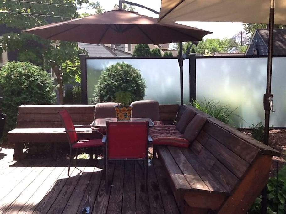 Private back deck with table and seating.