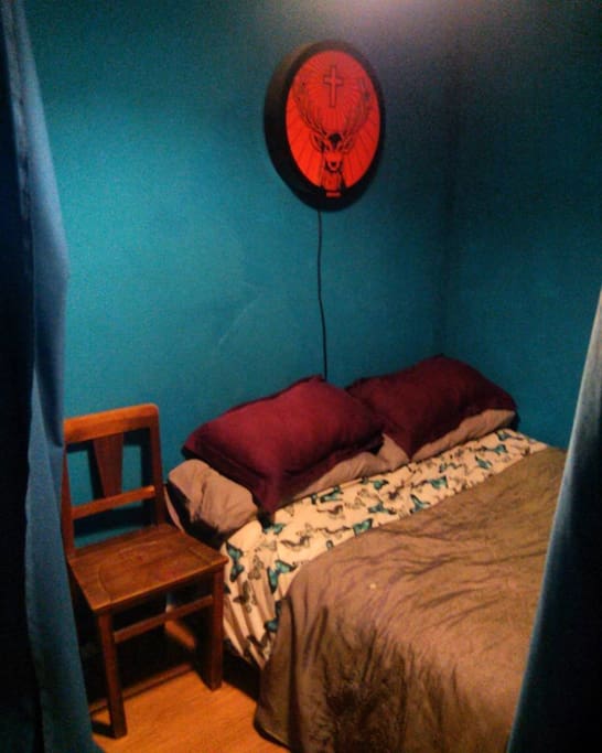 Your bed. Curtain divide from walk way to kitchen and bathroom.