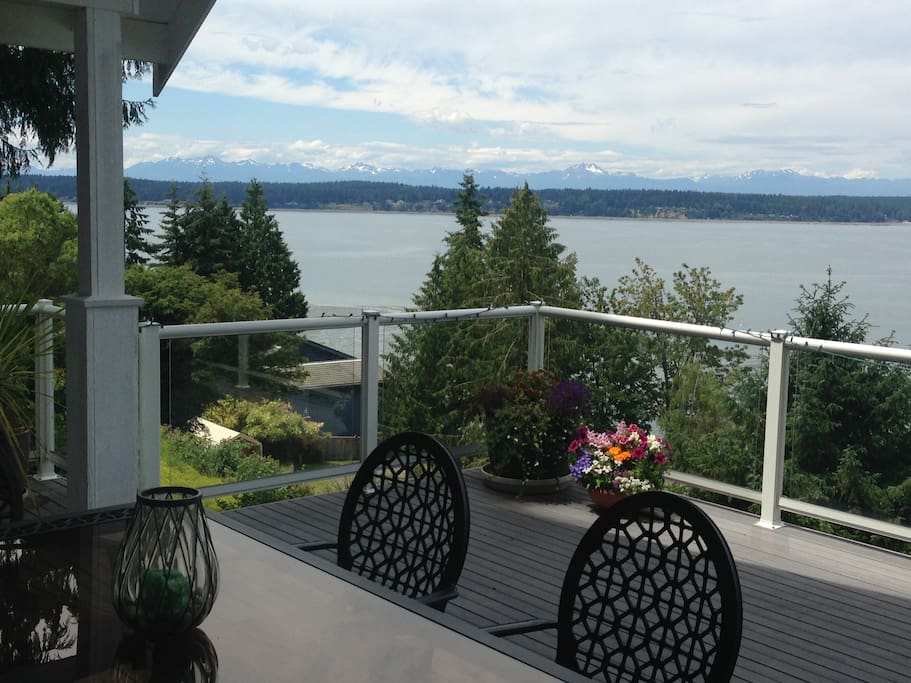 Enjoy dinner outside on the deck with a view of the Olympics
