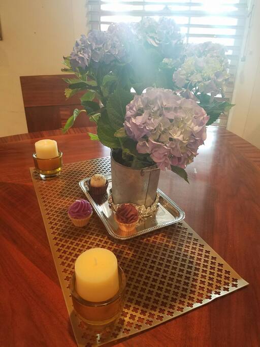 scented candles and flowers throughout