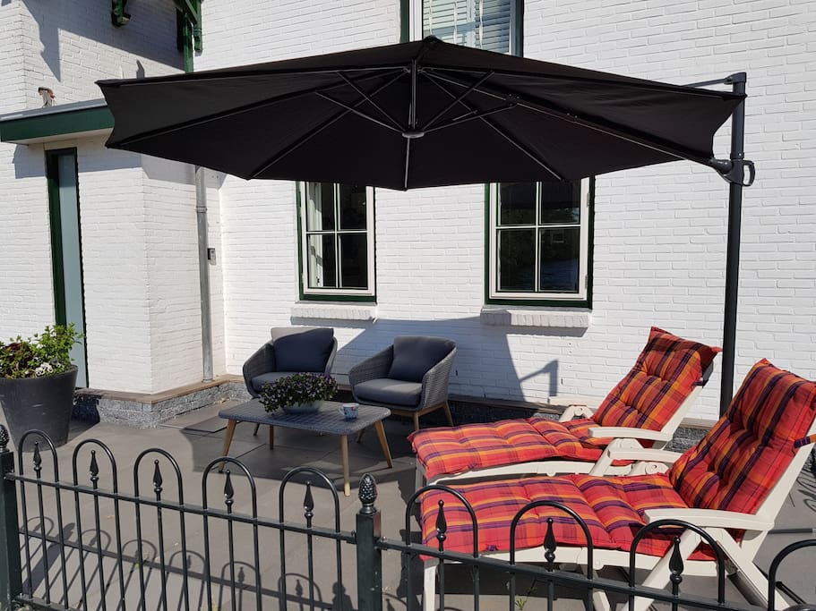 Enjoy the view from the terras in front of your room