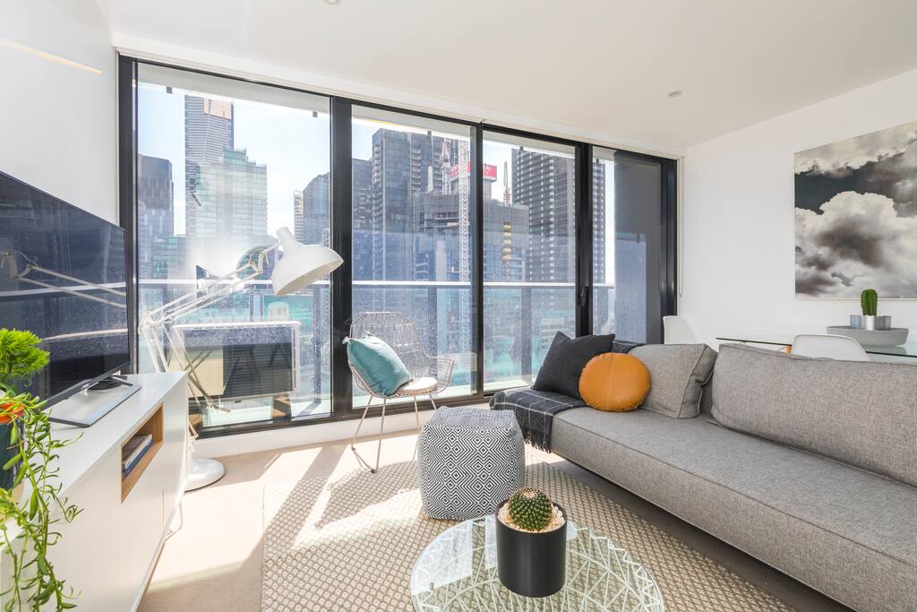 Open plan living area with sofa bed