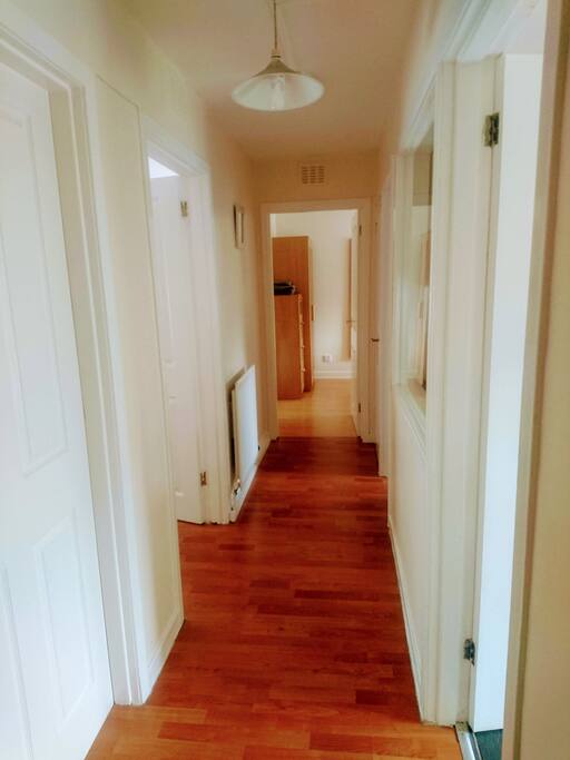 The hallway coming in from the front door.