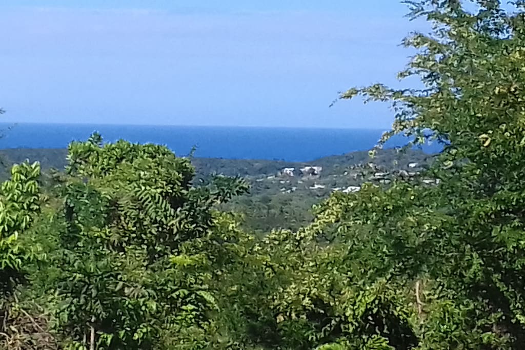 View of beautiful country mountain and caribbean sea