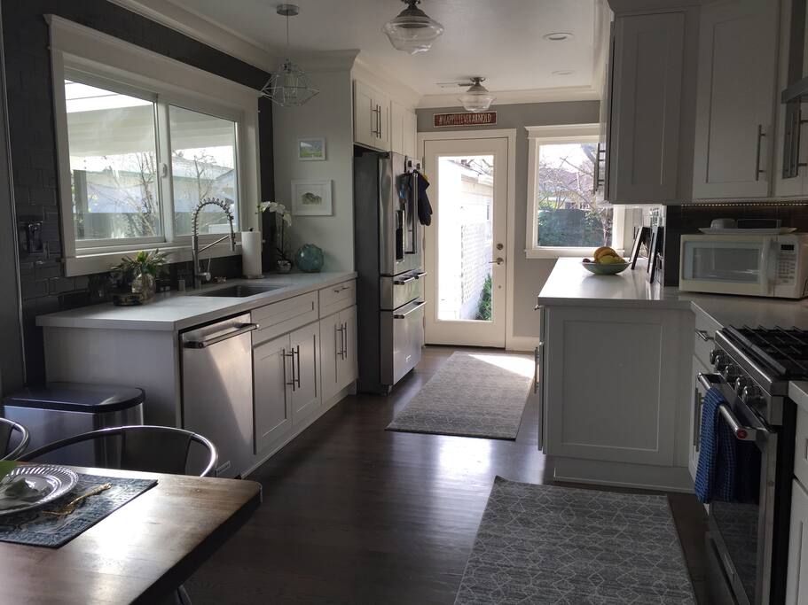 Newly remodeled gourmet kitchen. Fully stocked for all your cooking needs.