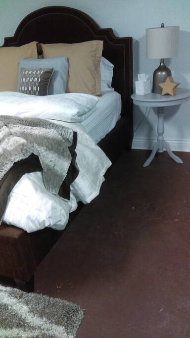 comfortable bed with soft lighting