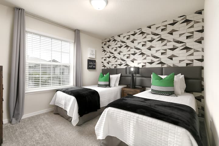 Si vous êtes fan des effets géométriques, vous allez adorer cette chambre double styliste !