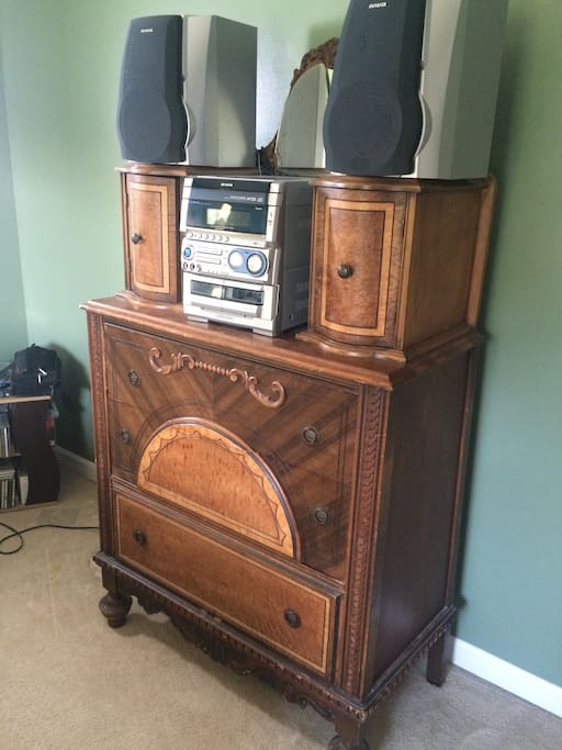Dresser and CD player in bedroom