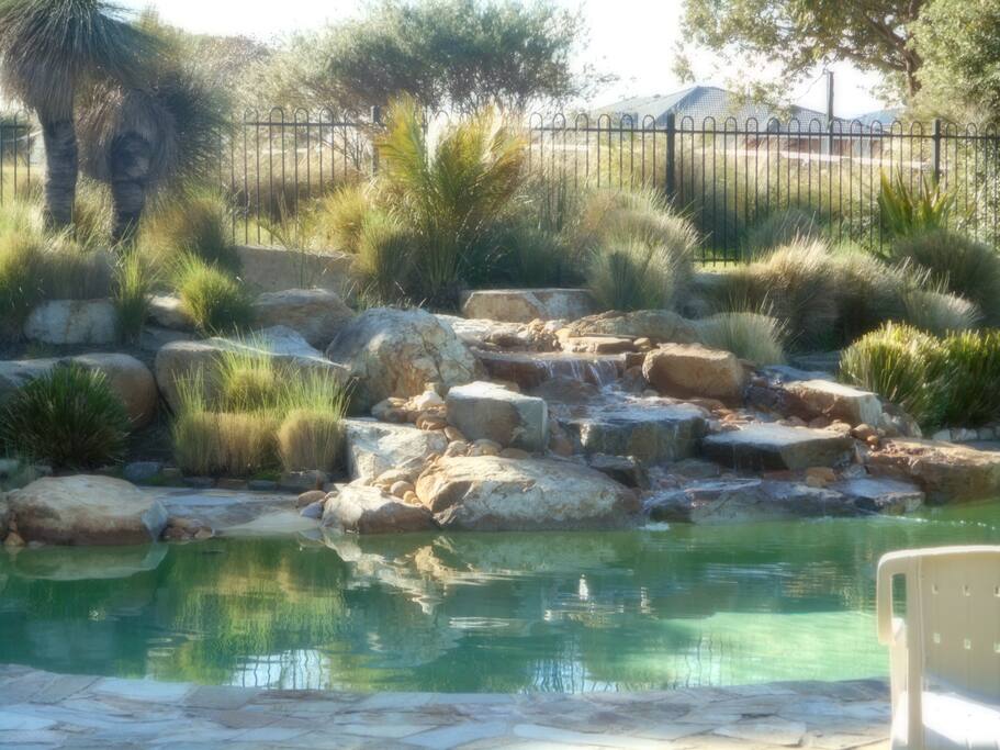 The picturesque waterfall in the Park Pool