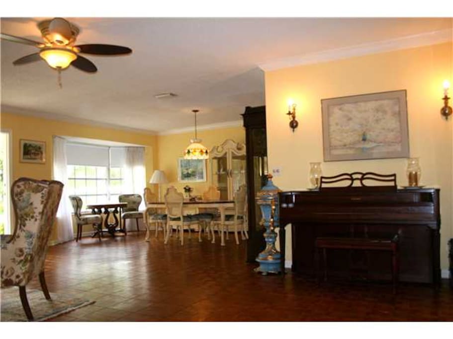Anyone play piano? Teak hardwood floors throughout.