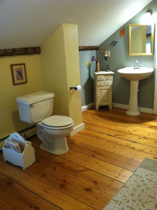 Upstairs shared bathroom. Combined shower and bathtub