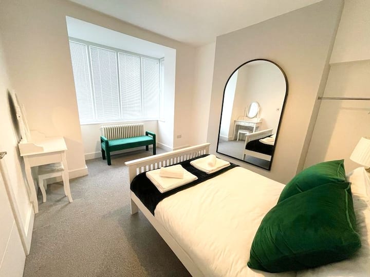 Bedroom 4 is located on the ground floor, which includes a double bed & dressing table. 
