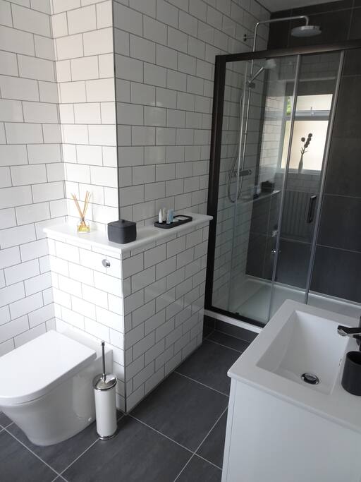 Large modern and stylish en-suite bathroom, with complimentary toiletries.