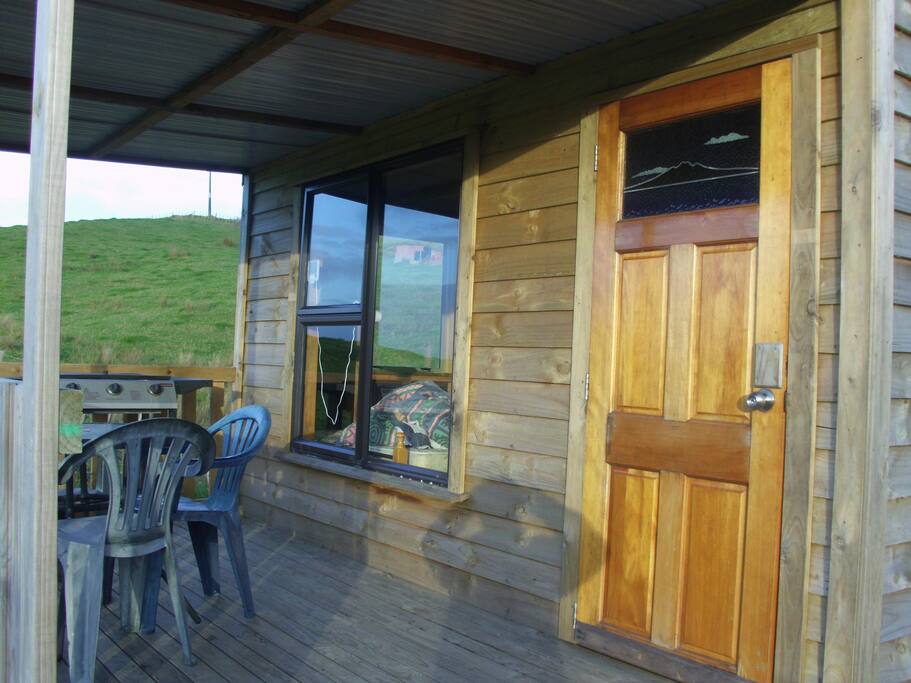 PRIVATE DECK WITH TABLE CHAIRS AND BBQ